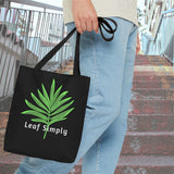 Man holding a Leaf Simply Stylish Small Tote Bag