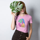 Woman holding a giant leaf wearing Be Leaf in Yourself Light Pink Unisex Cotton T-shirt